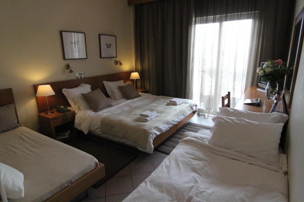 Achillion Hotel Athena Bagian luar foto