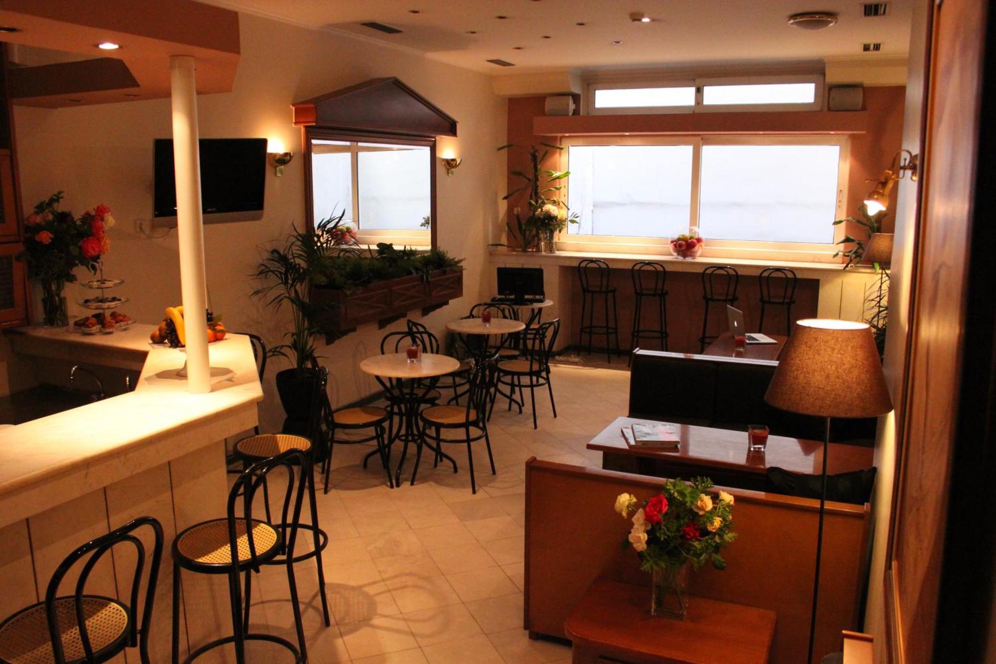 Achillion Hotel Athena Bagian luar foto